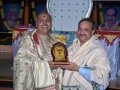 Sathguru presenting memento to Garimella Venkata Ramana Sharma