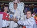 Sathguru presenting prasadam to Reka Usha Kiran along with his Younger Brother Sri Hussain Sha