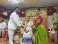 స్వామిని శాలువాతో  సత్కరిస్తున్న శ్రీ మద్దాల  శంకరనారాయణ  శ్రీమతి దుర్గావల్లి  దంపతులు