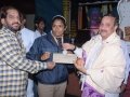 Donation of 5000 rupees check for International Boxing champian Miss Aruna by U.A.R.D.T