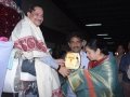 Sathguru presenting Memento to Mr & Mrs. Pothula Vishvam