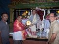 Sathguru presenting Memento to Mr.Jyothula Venkateswara Rao