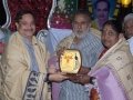Sathguru presenting Memento to Smt.Pilli Anantha Lakshmi