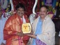 Memento to Sri.Gajal Srinivas by sathguru Dr.Umar Alisha