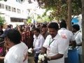 Volunteers distributing butter milk to devotees arrived for Godavari Puskharalu 7th day, 20th Jul 2015 Gowthami ghat, Rajahmundry