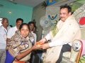 Sathguru Dr.Umar Alisha giving prasadam to one of the incharge DSP Sowjanya at Gowthami ghat , Rajahmundry  on 21 Jul 2015, 8th day of Puskharalu