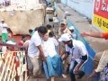 Volunteers assisting elderly on 24 Jul 2015, 11th day of Godavari Pushkaralu at Gowthami ghat