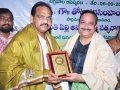 Dr.Umar Alisha ( current head of peetham) , great grand son of Kavisekhar Dr.Umar Alisha presenting memento to Sri. Thota Narasimham, M.P ( Kakinada)