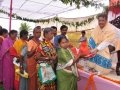 Distributing rice to poor people
