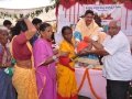 Distributing rice to poor people
