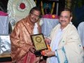 Sathguru Dr.Umar Alisha presenting memento to Cheif Guest S.R.Bhallam, sahitivetha​