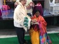 Sathguru Dr.Umar Alisha felicitating Smt. Pantham Rajani , Mayor ( Rajahmundry)