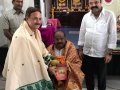 Sathguru Dr.Umar Alisha felicitating Sri Akula Satyanarayana , M.L.A ( Rajahmundry)