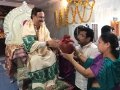 Sri Thota Satyanarayana and Smt.Subbalakshmi presenting pot of drink to Sathguru Dr.Umar Alisha