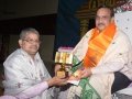 Sathguru Dr.Umar alisha presenting memento to Mr. Sri Vedula Sri Rama Sharma